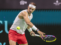 In Malaga, Spain, on November 16, 2024, Rafael Nadal of Spain plays a forehand during a Spain training session in preparation for the Davis...