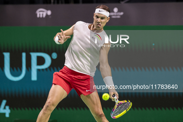 In Malaga, Spain, on November 16, 2024, Rafael Nadal of Spain plays a forehand during a Spain training session in preparation for the Davis...