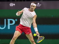 In Malaga, Spain, on November 16, 2024, Rafael Nadal of Spain plays a forehand during a Spain training session in preparation for the Davis...