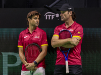 In Malaga, Spain, on November 16, 2024, Carlos Moya of Spain and David Ferrer, captain of Spain, participate in a training session in prepar...