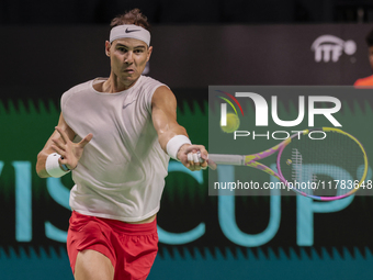 In Malaga, Spain, on November 16, 2024, Rafael Nadal of Spain plays a forehand during a Spain training session in preparation for the Davis...