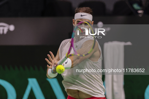 In Malaga, Spain, on November 16, 2024, Rafael Nadal of Spain plays a forehand during a Spain training session in preparation for the Davis...