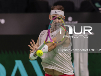 In Malaga, Spain, on November 16, 2024, Rafael Nadal of Spain plays a forehand during a Spain training session in preparation for the Davis...