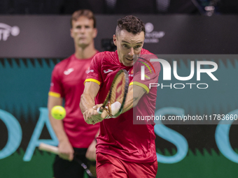 In Malaga, Spain, on November 16, 2024, Roberto Bautista of Spain plays backwards during a Spain training session in preparation for the Dav...