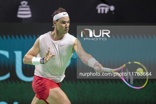 In Malaga, Spain, on November 16, 2024, Rafael Nadal of Spain plays a forehand during a Spain training session in preparation for the Davis...