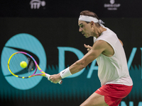 Rafael Nadal of Spain plays backwards during a Spain training session in preparation for the Davis Cup tie against the Netherlands at Palaci...