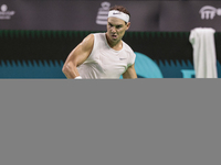 In Malaga, Spain, on November 16, 2024, Rafael Nadal of Spain plays a forehand during a Spain training session in preparation for the Davis...