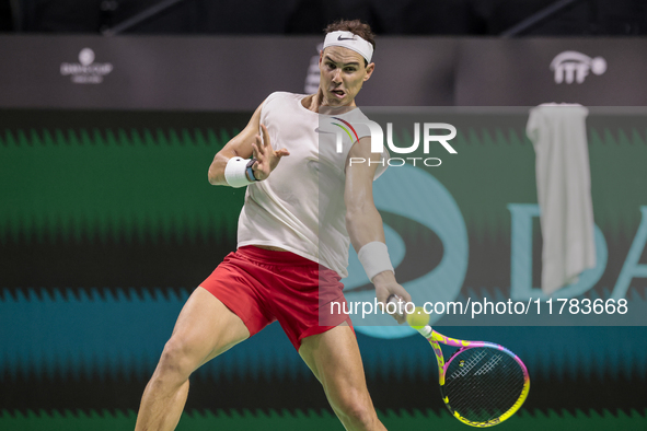 In Malaga, Spain, on November 16, 2024, Rafael Nadal of Spain plays a forehand during a Spain training session in preparation for the Davis...