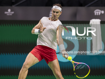 In Malaga, Spain, on November 16, 2024, Rafael Nadal of Spain plays a forehand during a Spain training session in preparation for the Davis...