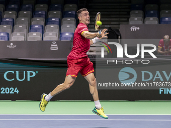 In Malaga, Spain, on November 16, 2024, Roberto Bautista of Spain plays a forehand during a Spain training session in preparation for the Da...