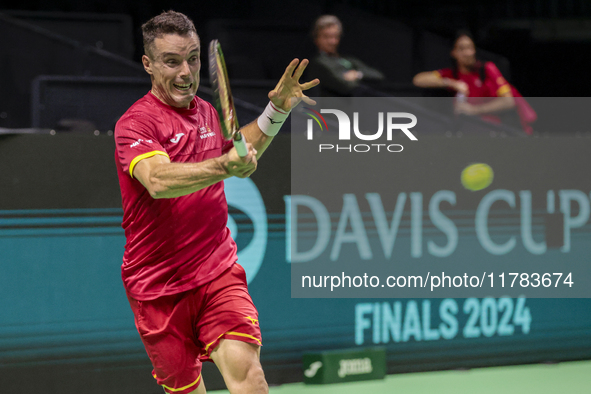 In Malaga, Spain, on November 16, 2024, Roberto Bautista of Spain plays a forehand during a Spain training session in preparation for the Da...