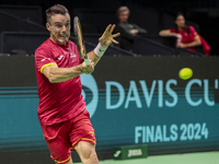 In Malaga, Spain, on November 16, 2024, Roberto Bautista of Spain plays a forehand during a Spain training session in preparation for the Da...