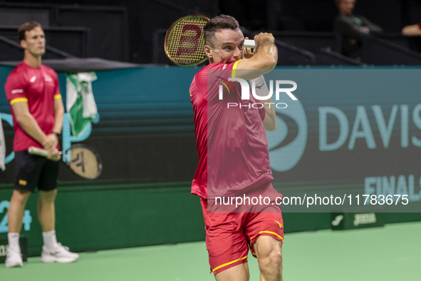 In Malaga, Spain, on November 16, 2024, Roberto Bautista of Spain plays a forehand during a Spain training session in preparation for the Da...