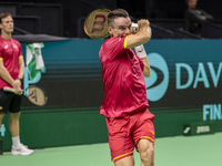 In Malaga, Spain, on November 16, 2024, Roberto Bautista of Spain plays a forehand during a Spain training session in preparation for the Da...