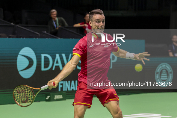 In Malaga, Spain, on November 16, 2024, Roberto Bautista of Spain plays a forehand during a Spain training session in preparation for the Da...