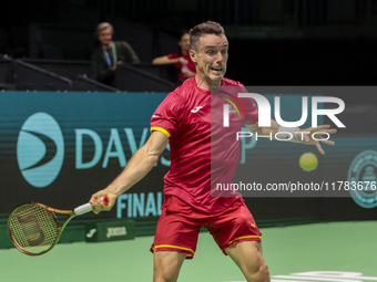 In Malaga, Spain, on November 16, 2024, Roberto Bautista of Spain plays a forehand during a Spain training session in preparation for the Da...