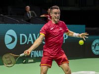 In Malaga, Spain, on November 16, 2024, Roberto Bautista of Spain plays a forehand during a Spain training session in preparation for the Da...