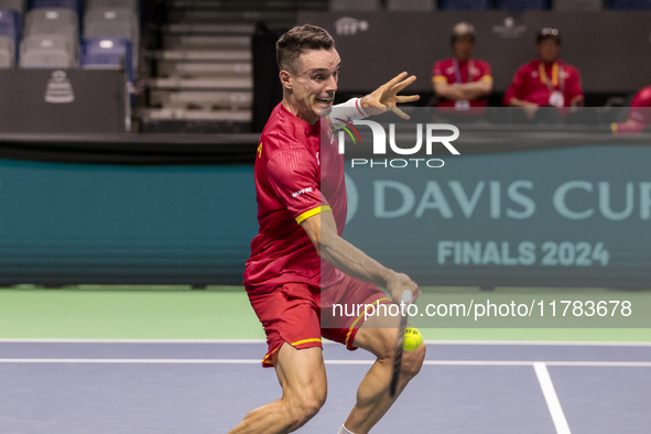 In Malaga, Spain, on November 16, 2024, Roberto Bautista of Spain plays a forehand during a Spain training session in preparation for the Da...