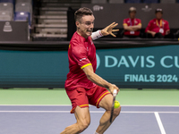 In Malaga, Spain, on November 16, 2024, Roberto Bautista of Spain plays a forehand during a Spain training session in preparation for the Da...