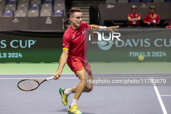 In Malaga, Spain, on November 16, 2024, Roberto Bautista of Spain plays a forehand during a Spain training session in preparation for the Da...