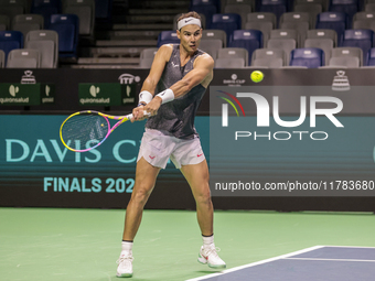 Rafael Nadal of Spain plays backwards during a Spain training session in preparation for the Davis Cup tie against the Netherlands at Palaci...