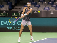 Rafael Nadal of Spain plays backwards during a Spain training session in preparation for the Davis Cup tie against the Netherlands at Palaci...