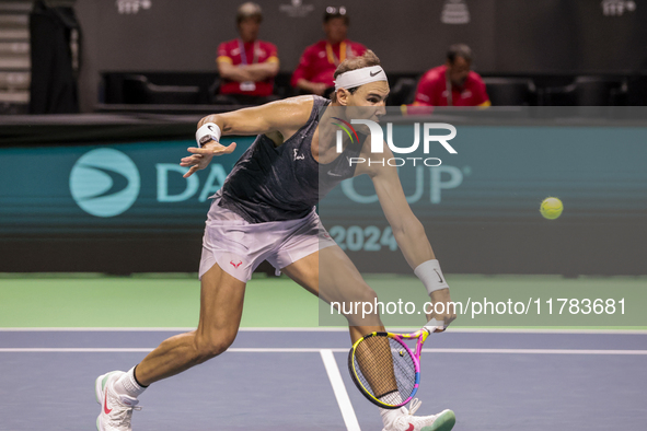 Rafael Nadal of Spain plays backwards during a Spain training session in preparation for the Davis Cup tie against the Netherlands at Palaci...