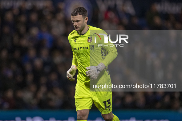 Callum Burton #13 (GK) of Wrexham A.F.C. participates in the Sky Bet League 1 match between Stockport County and Wrexham at the Edgeley Park...