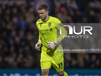 Callum Burton #13 (GK) of Wrexham A.F.C. participates in the Sky Bet League 1 match between Stockport County and Wrexham at the Edgeley Park...