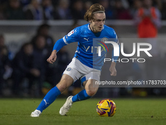 Lewis Bate #4 of Stockport County F.C. participates in the Sky Bet League 1 match between Stockport County and Wrexham at the Edgeley Park S...