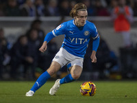 Lewis Bate #4 of Stockport County F.C. participates in the Sky Bet League 1 match between Stockport County and Wrexham at the Edgeley Park S...