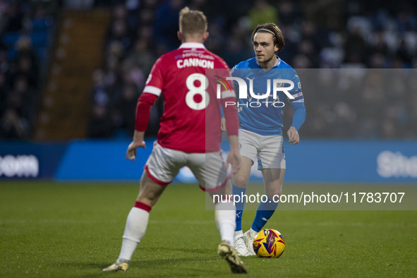 Lewis Bate, number 4 of Stockport County F.C., is in possession of the ball during the Sky Bet League 1 match between Stockport County and W...