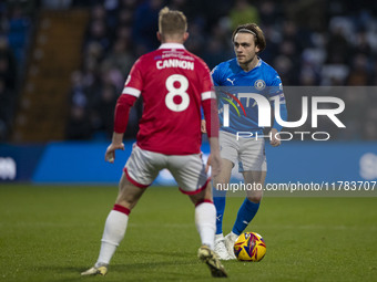 Lewis Bate, number 4 of Stockport County F.C., is in possession of the ball during the Sky Bet League 1 match between Stockport County and W...