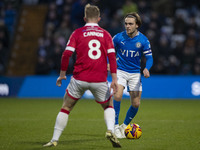 Lewis Bate, number 4 of Stockport County F.C., is in possession of the ball during the Sky Bet League 1 match between Stockport County and W...