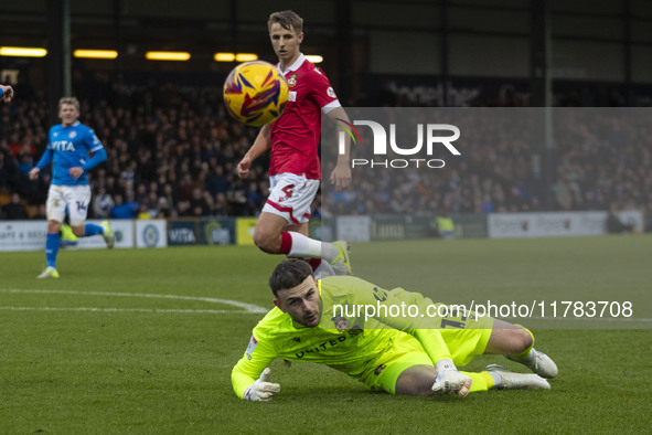 Callum Burton #13 (GK) of Wrexham A.F.C. makes a save during the Sky Bet League 1 match between Stockport County and Wrexham at the Edgeley...