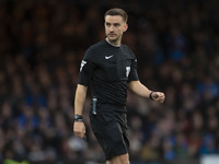 Referee Thomas Kirk officiates the Sky Bet League 1 match between Stockport County and Wrexham at the Edgeley Park Stadium in Stockport, Eng...