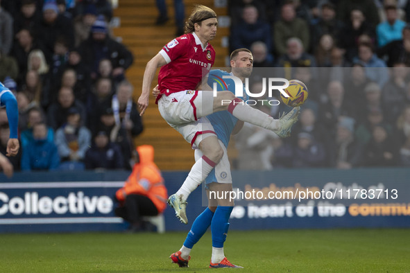 Jon Daoi Boovarsson #28 of Wrexham A.F.C. controls the ball during the Sky Bet League 1 match between Stockport County and Wrexham at the Ed...