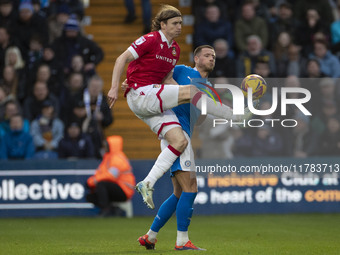 Jon Daoi Boovarsson #28 of Wrexham A.F.C. controls the ball during the Sky Bet League 1 match between Stockport County and Wrexham at the Ed...