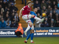 Jon Daoi Boovarsson #28 of Wrexham A.F.C. controls the ball during the Sky Bet League 1 match between Stockport County and Wrexham at the Ed...