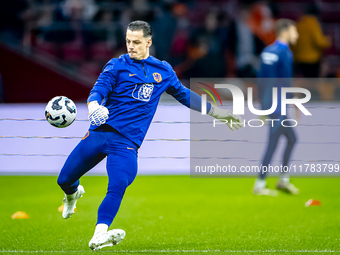 Netherlands goalkeeper Nick Olij participates in the match between the Netherlands and Hungary at the Johan Cruijff ArenA for the UEFA Natio...