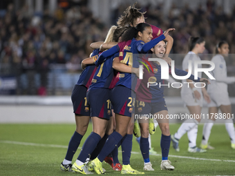 Several players of FC Barcelona celebrate a goal during the LIGA F match between Real Madrid and FC Barcelona at Alfredo Di Stefano Stadium...