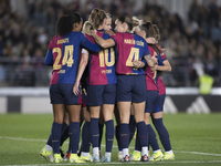 Several players of FC Barcelona celebrate a goal during the LIGA F match between Real Madrid and FC Barcelona at Alfredo Di Stefano Stadium...