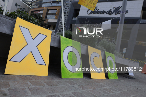 Residents of the town of Xoco in Coyoacan, Mexico City, place signs and banners outside the Mitikah shopping mall to protest the constructio...