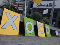 Residents of the town of Xoco in Coyoacan, Mexico City, place signs and banners outside the Mitikah shopping mall to protest the constructio...