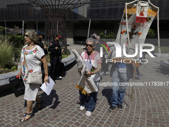 Residents of the town of Xoco in Coyoacan, Mexico City, protest outside the Mitikah shopping mall in Mexico City, Mexico, on November 16, 20...