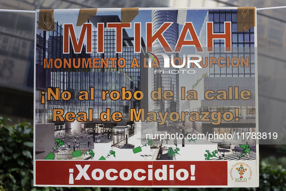 Residents of the town of Xoco in Coyoacan, Mexico City, place signs and banners outside the Mitikah shopping mall to protest the constructio...