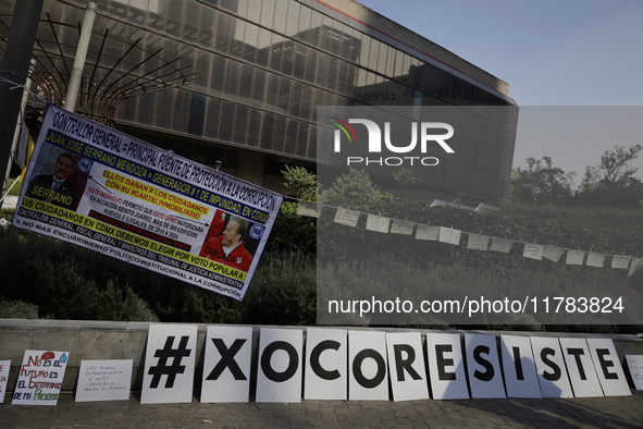 Residents of the town of Xoco in Coyoacan, Mexico City, place signs and banners outside the Mitikah shopping mall to protest the constructio...