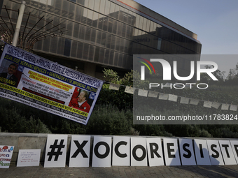 Residents of the town of Xoco in Coyoacan, Mexico City, place signs and banners outside the Mitikah shopping mall to protest the constructio...