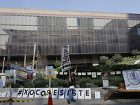 Residents of the town of Xoco in Coyoacan, Mexico City, place signs and banners outside the Mitikah shopping mall to protest the constructio...