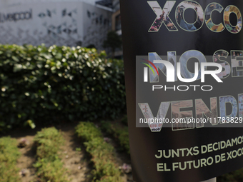 Residents of the town of Xoco in Coyoacan, Mexico City, place signs and banners outside the Mitikah shopping mall to protest the constructio...